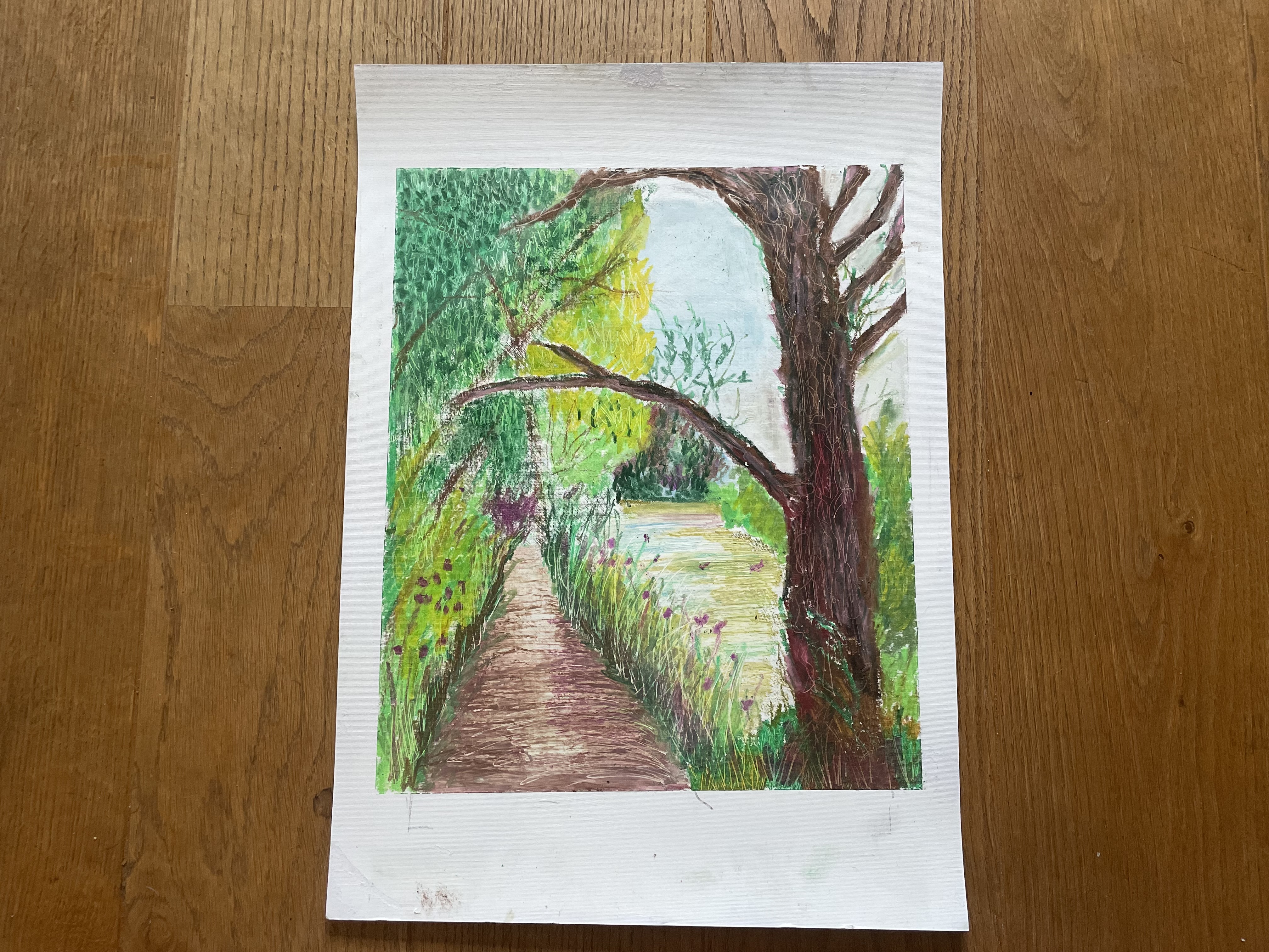 Oil pastel of path leading up into left hand side of the painting alongside a river on the right. Framed by a brown textured tree in the foreground on the right and lovely green vibrant bushes and foliage on the left