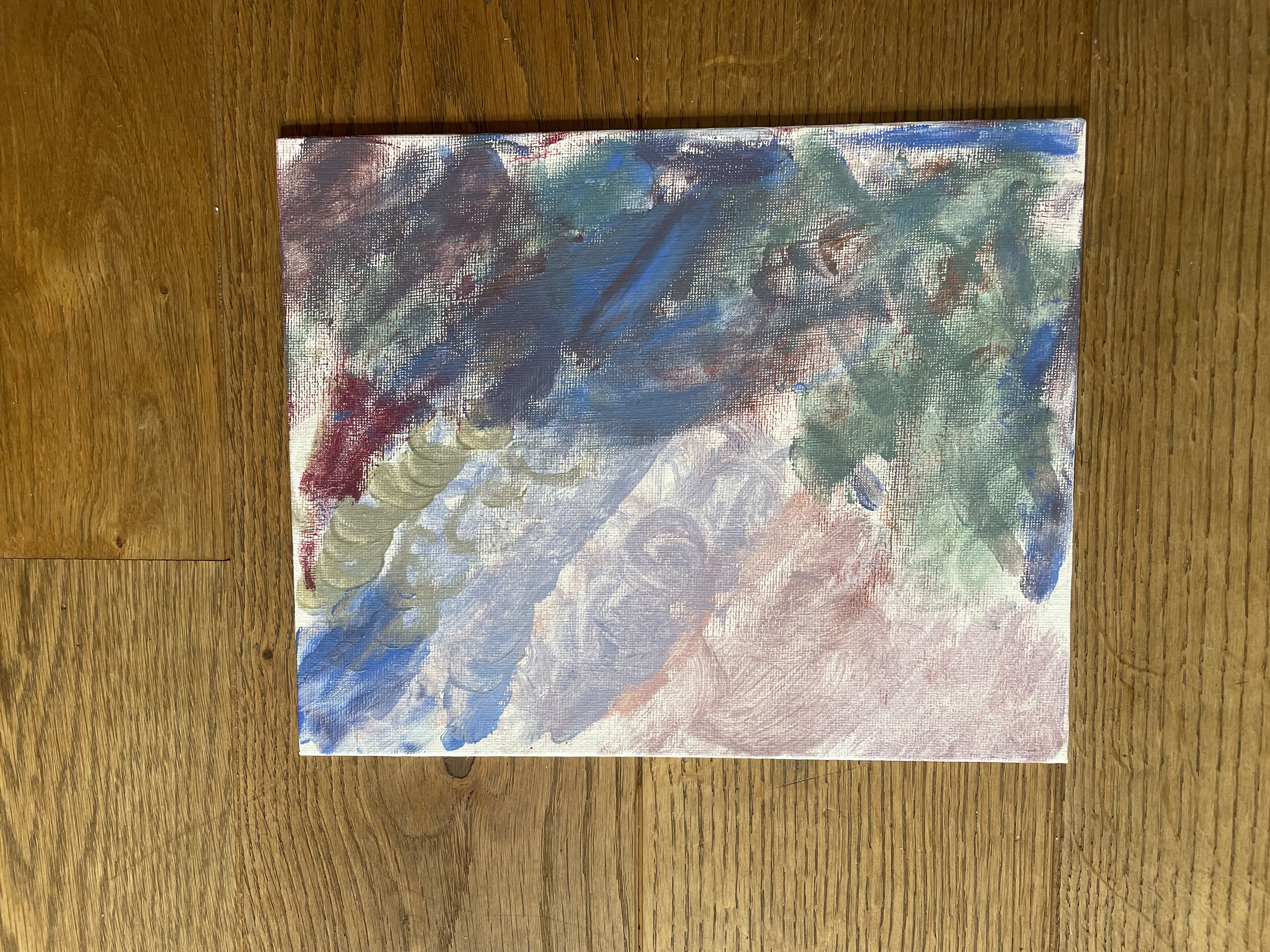 Monet style colours laid down with greens and blues running across the bottom, pinks and lilacs to show sky and a smear of brown at the right.