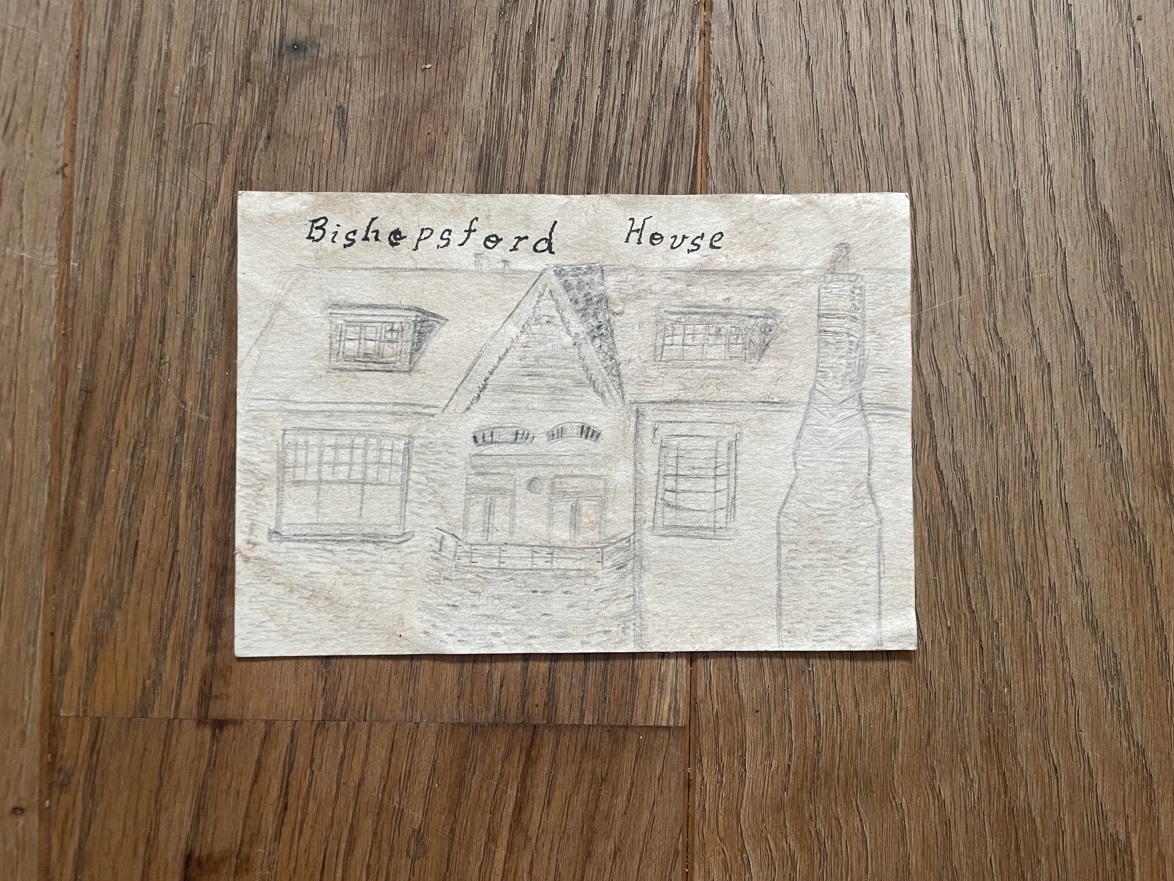 Pencil drawing of the roof of Bishopsford House aged to give a sepia tint. Bishopsford House written above roof in caligraphy.