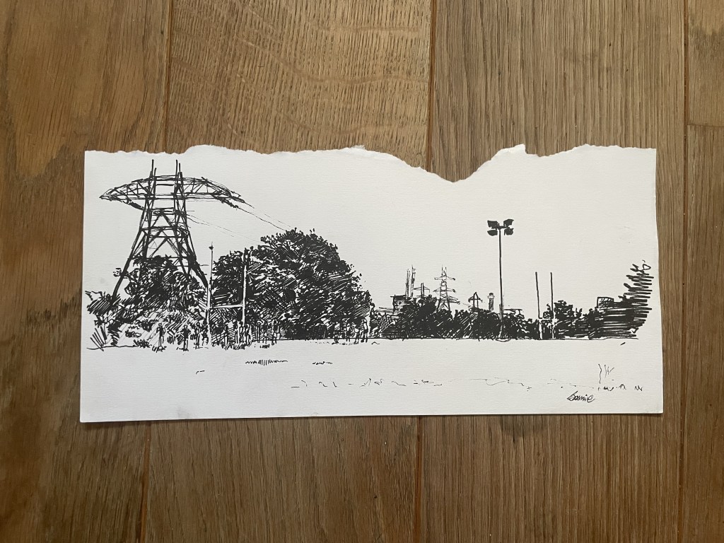 Pen and ink drawing of Poulter Park skyline across the rugby pitch towards Croydon. Large foreshortened pylon in the foreground with a rugby goal and players underneath. Tree line extends in between the pylon and players towards more pylons further away on the right and the pitch lights silhouetted against the sky